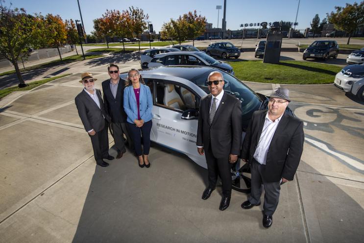 UC Davis Team stands in front of all-electric i3 BMW