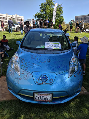 Image of "Whiteboard" Nissan Leaf Decorated With Drawings at EV Showcase 2018